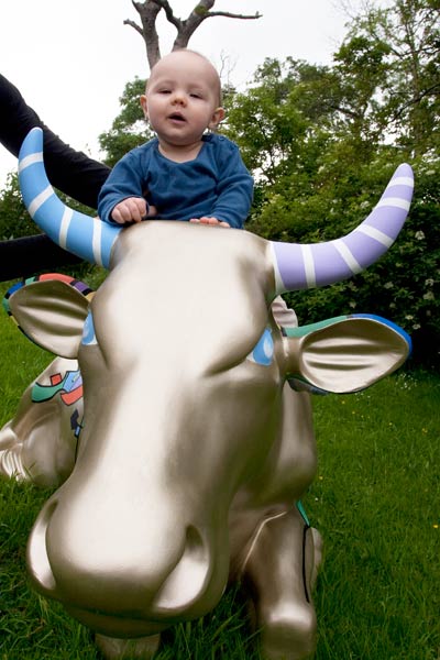 Me sitting on mummy's cow for the Cow Parade