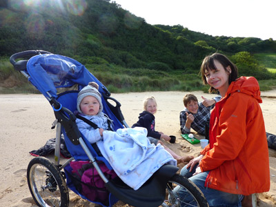 The family on the beach at Kinnagoe Bay
